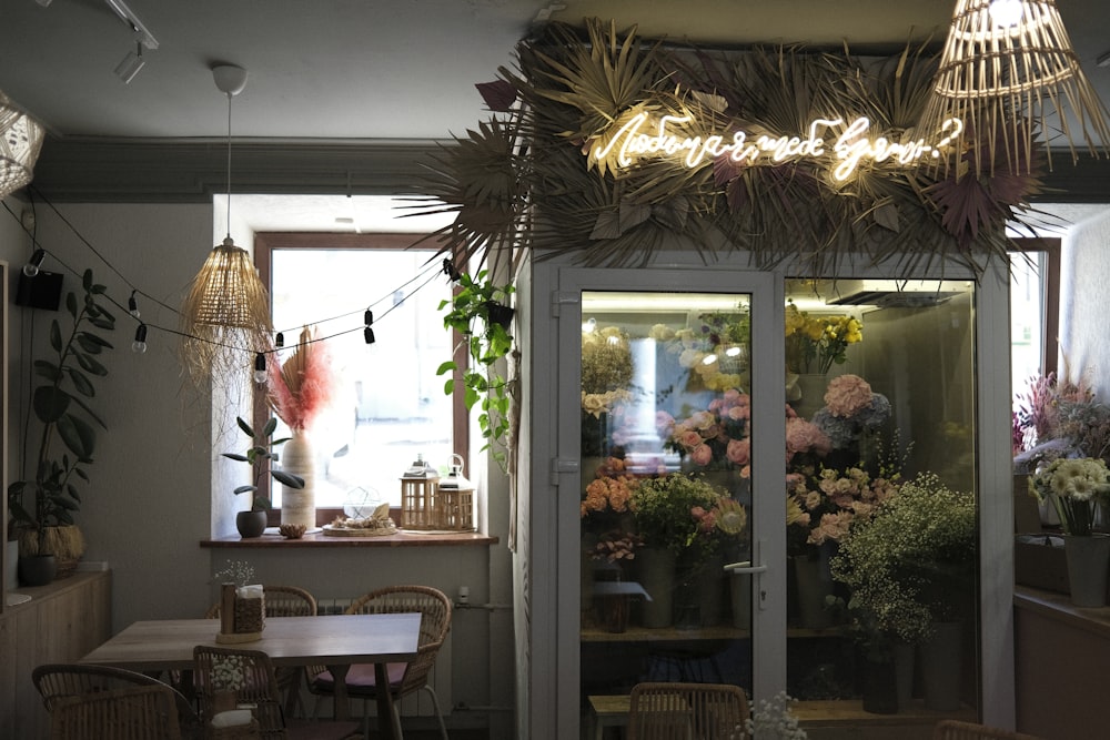 a dining room with a chandelier over the table