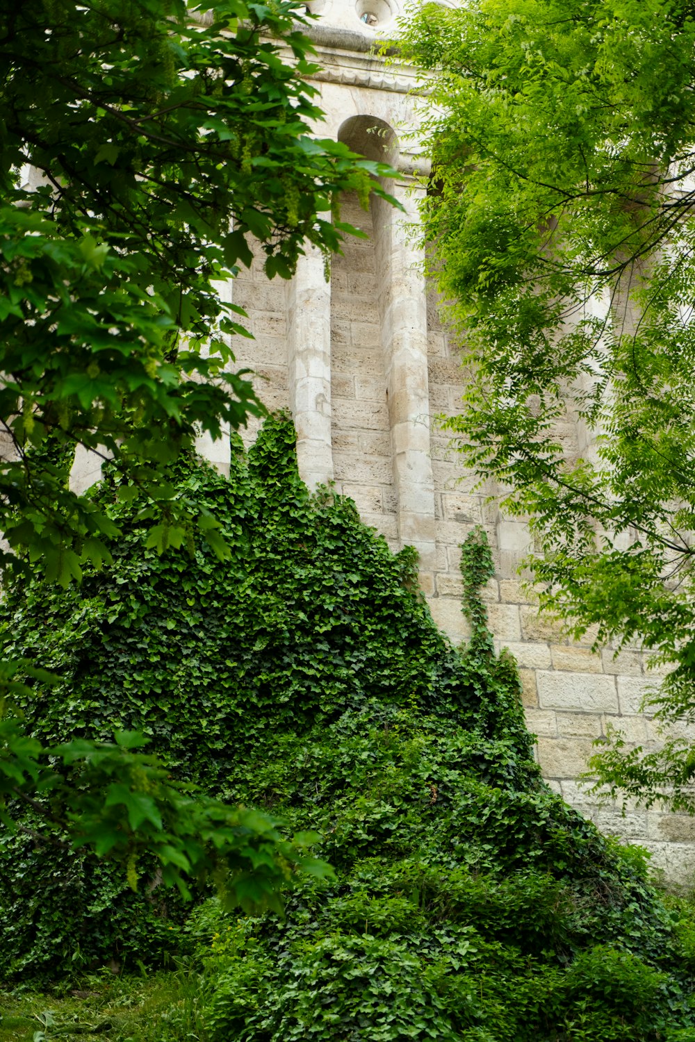 a stone building with a large archway