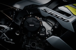A close-up view of a high-performance motorcycle engine with the label 