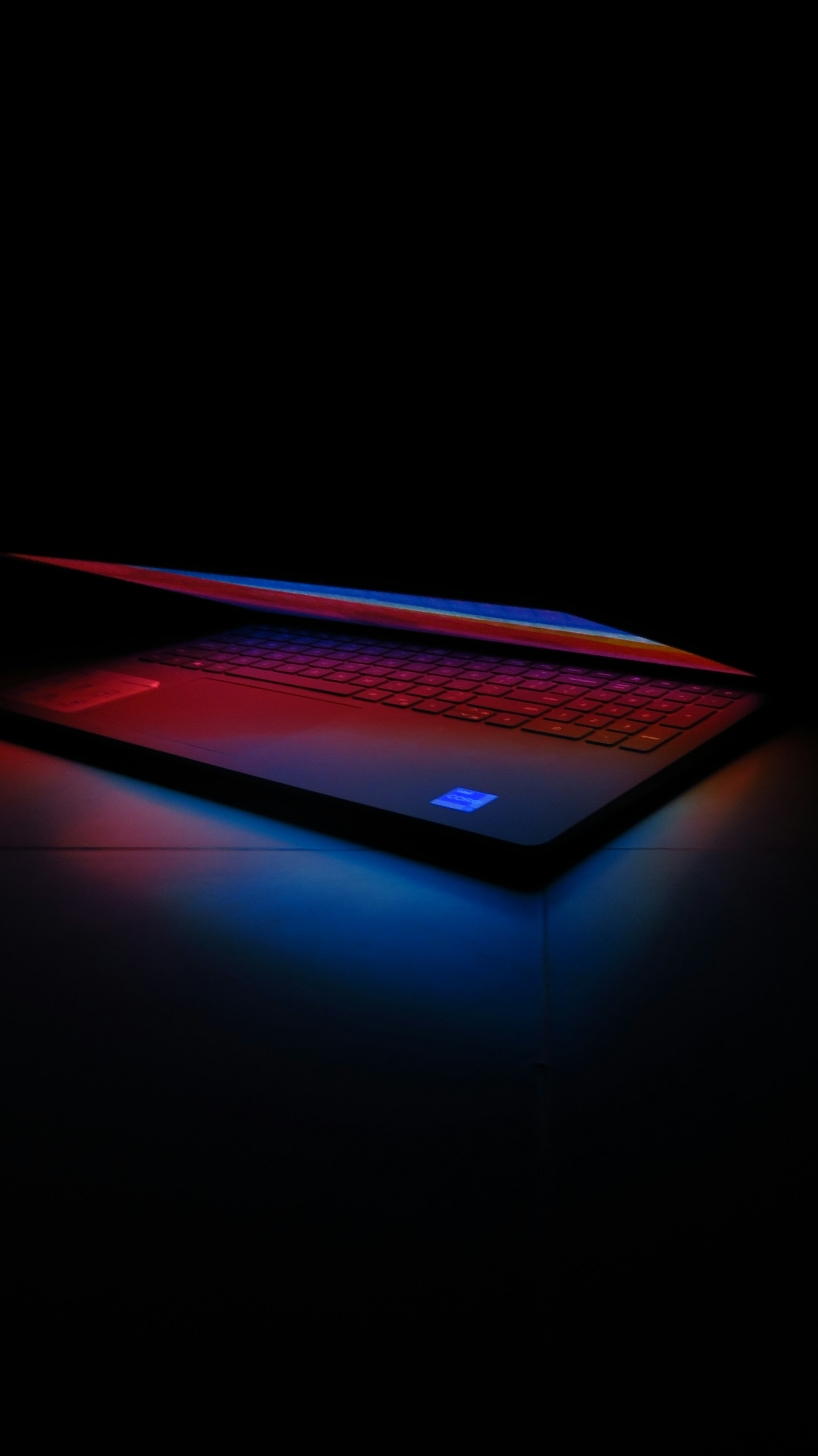 a laptop with a red light