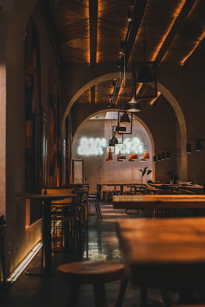 The rustic wood-toned interior of a small countryside restaurant