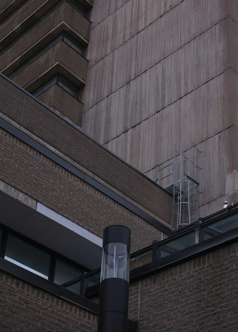 a building with a metal pole