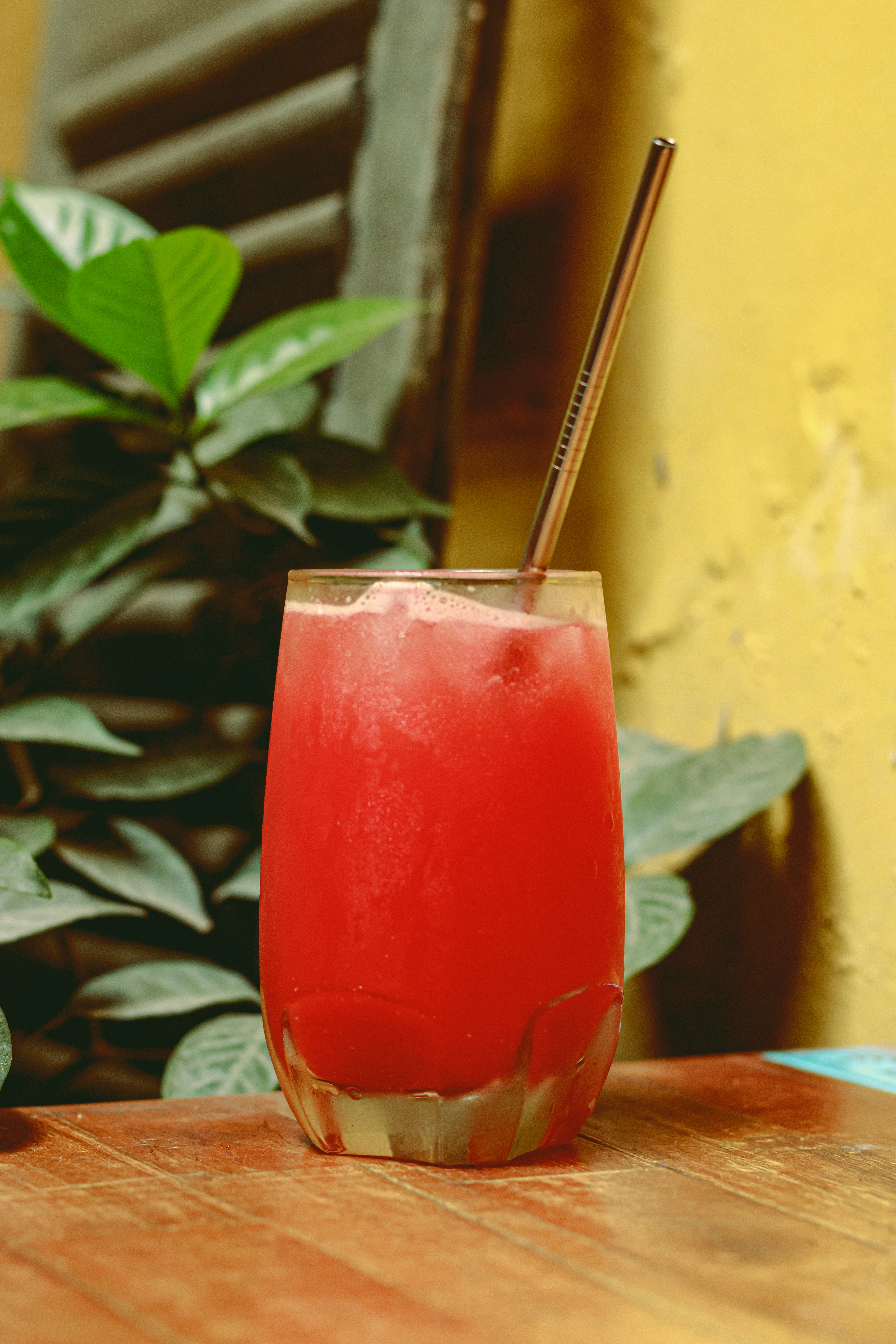 a glass of red liquid