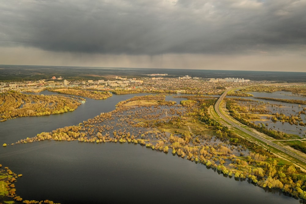 a river with a city in the distance