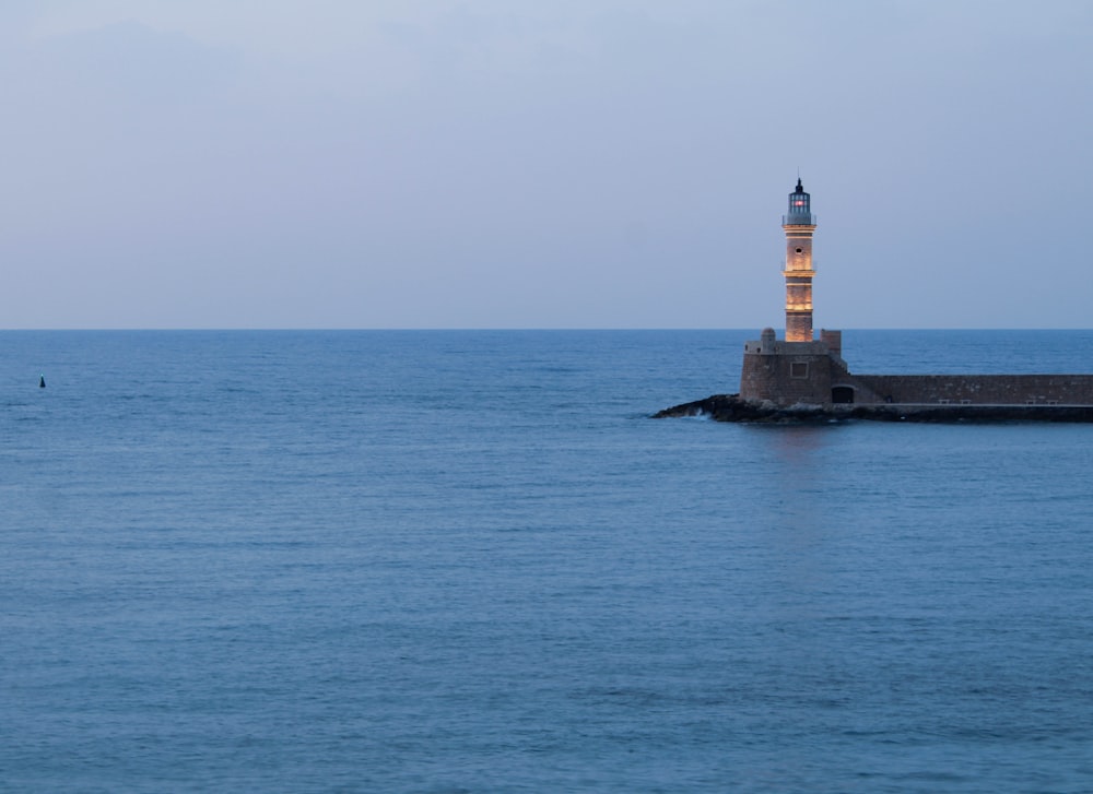 a lighthouse on a small island