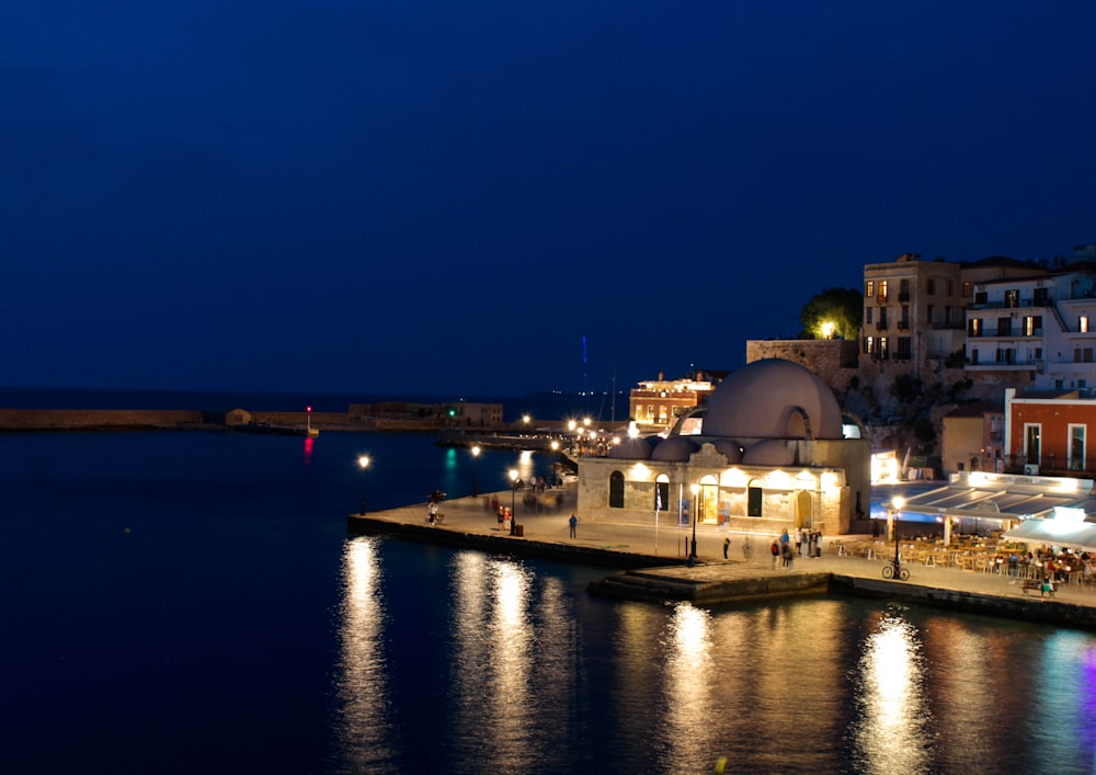 a body of water with buildings along it