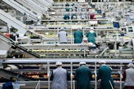 a group of men in a factory