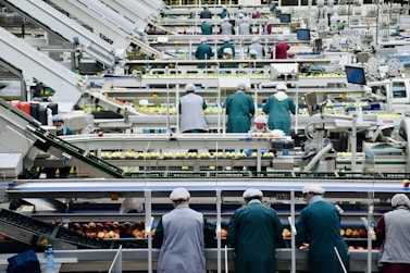a group of men in a factory