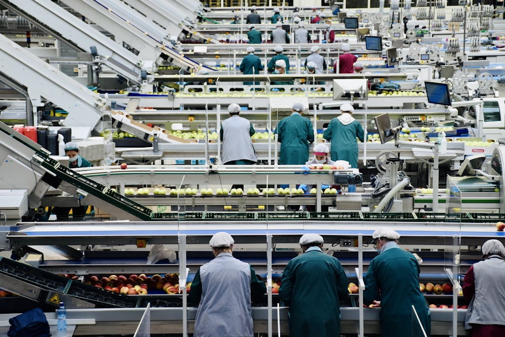 a group of men in a factory