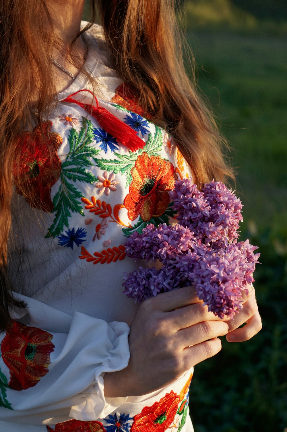 a woman holding flowers