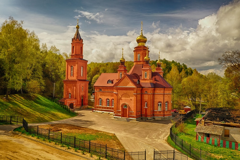 a large red building with a tower