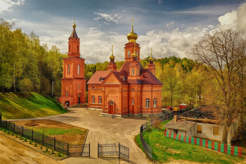 a large red building with towers