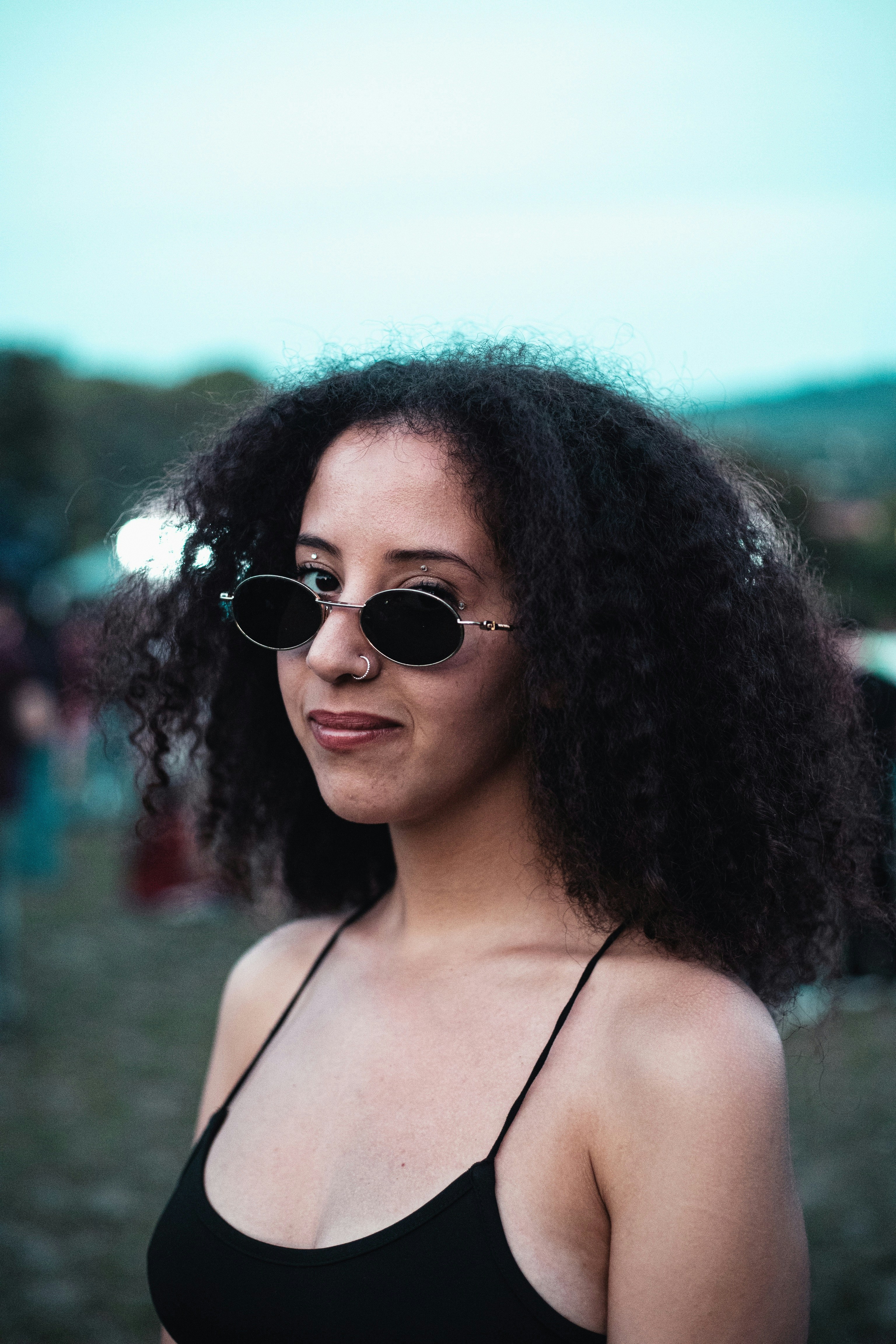A woman with curly hair photo – Free Torino Image on Unsplash