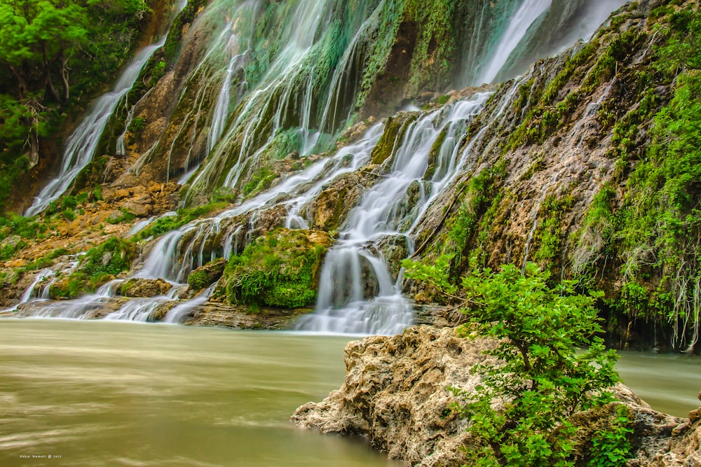 a waterfall with a group of waterfalls