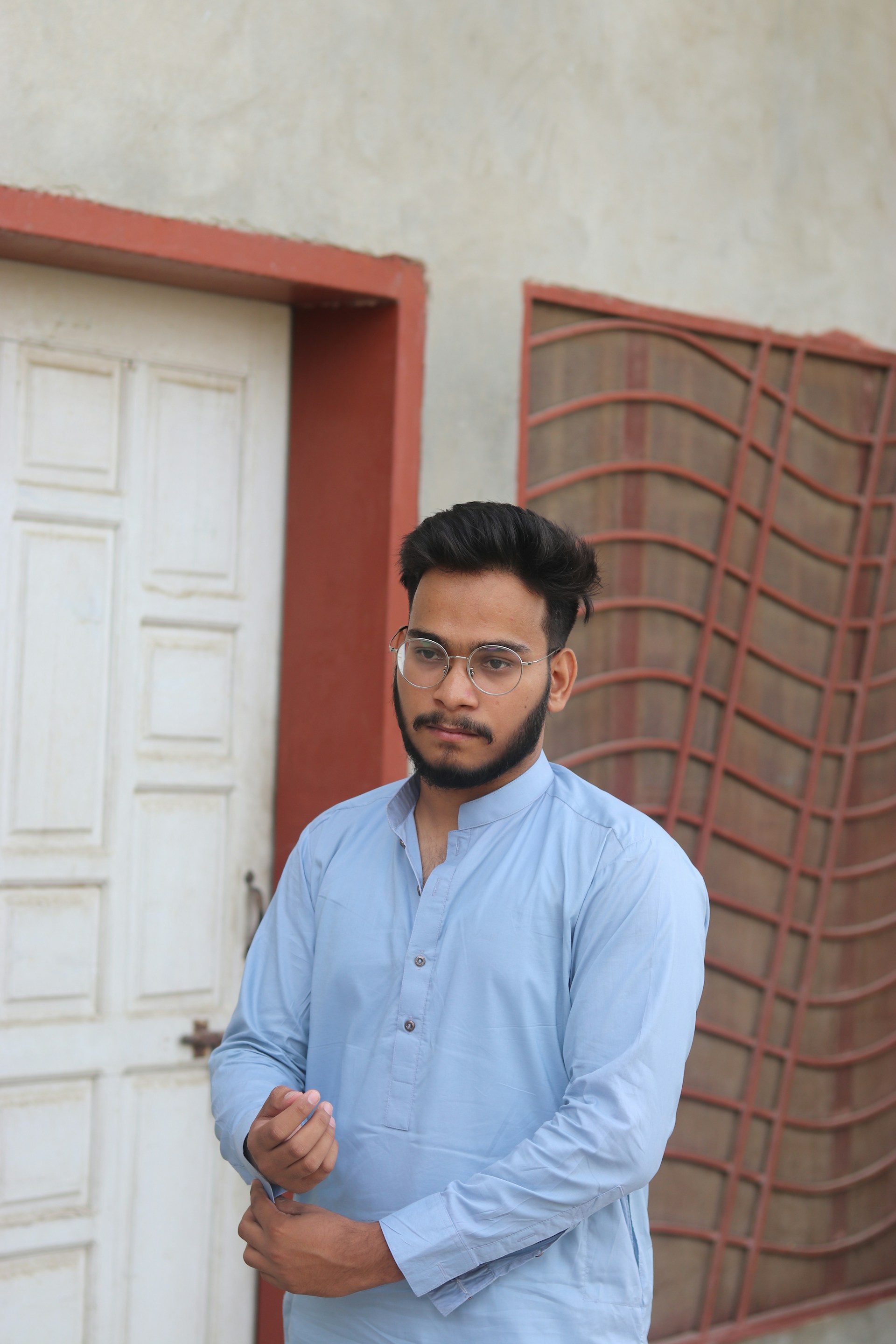 woman wearing yellow long-sleeved dress under white clouds and blue sky during daytime