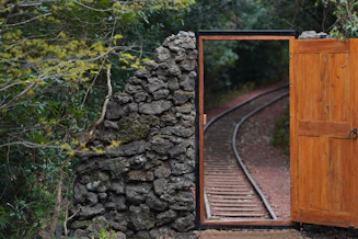 a train track with a tunnel