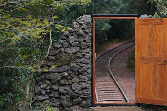 a train track with a tunnel