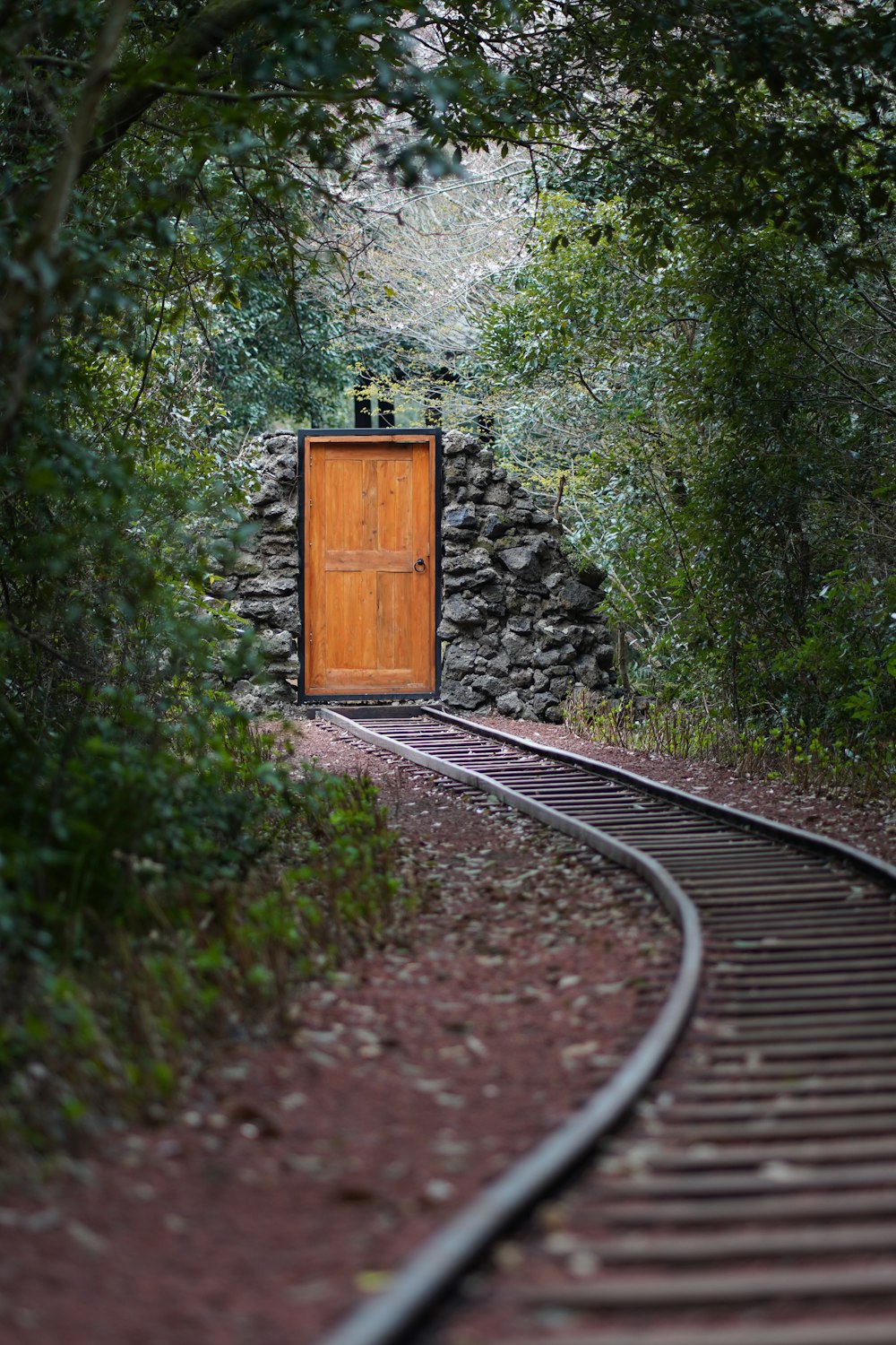 a wooden box on a train track