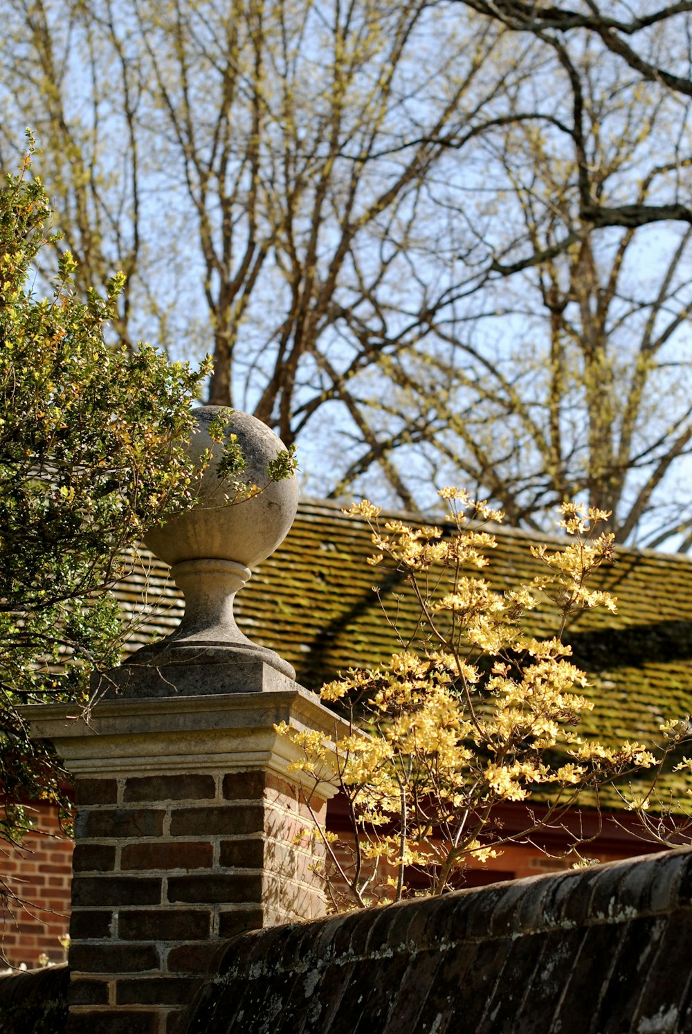 a stone chimney on a roof