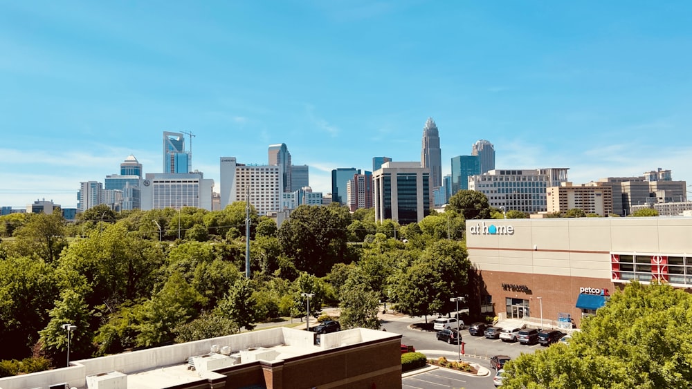 a city skyline with a parking lot