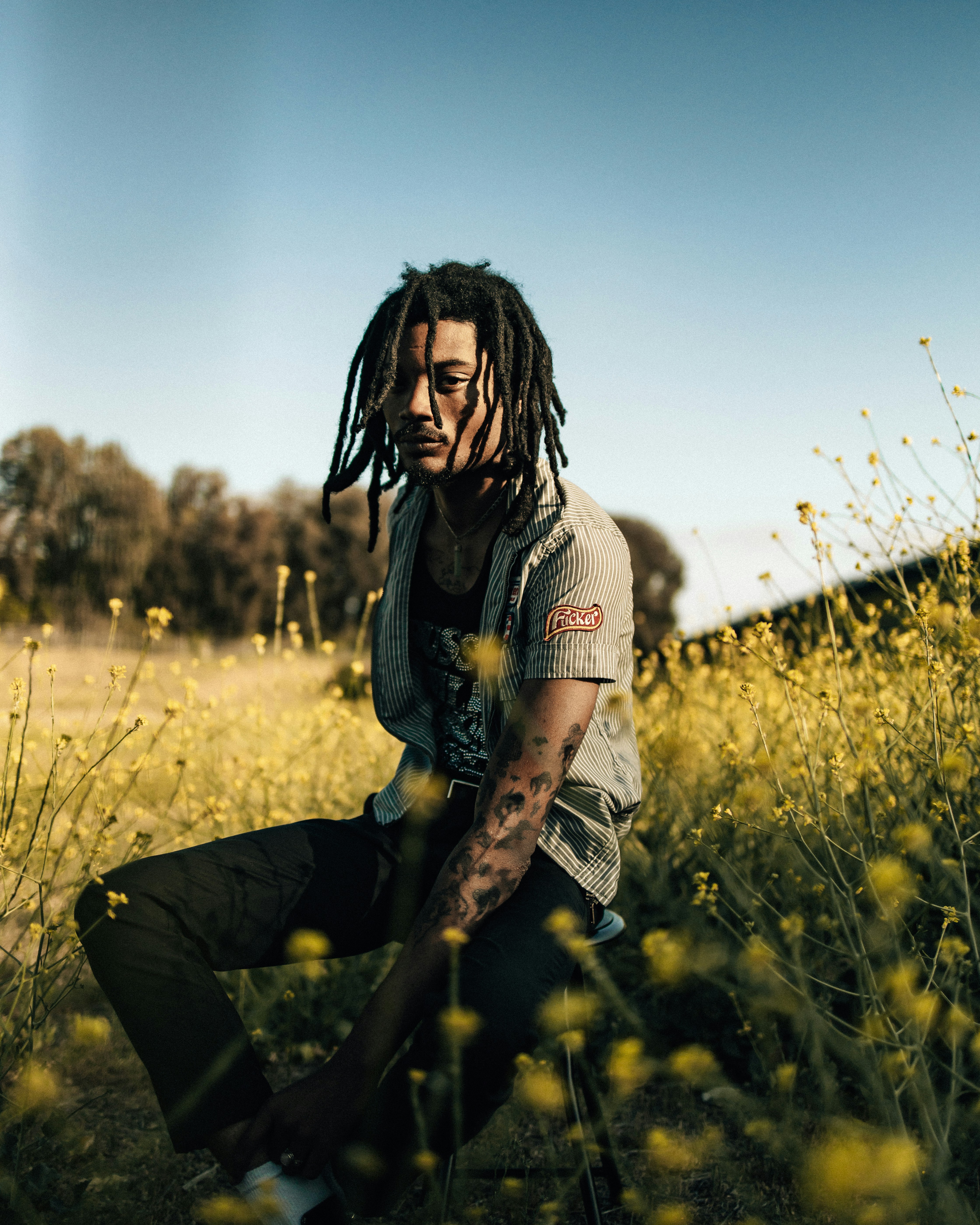 a person sitting in a field