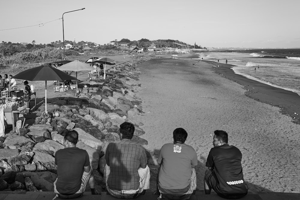 people sitting on a beach