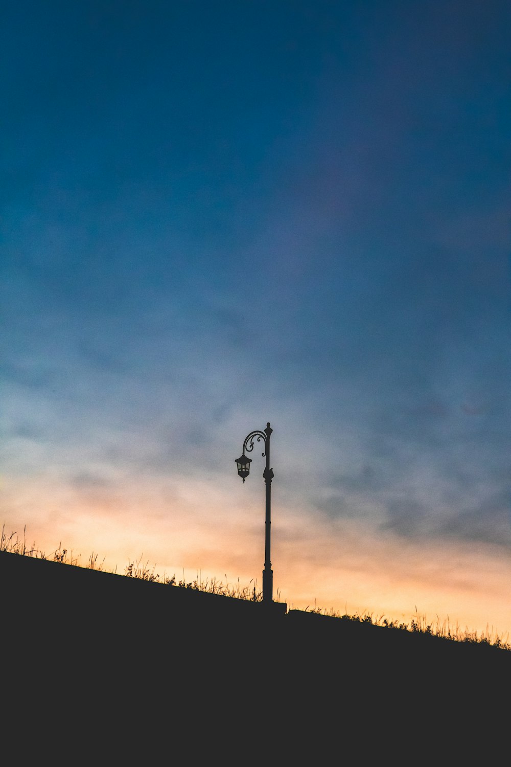 a street light on a hill