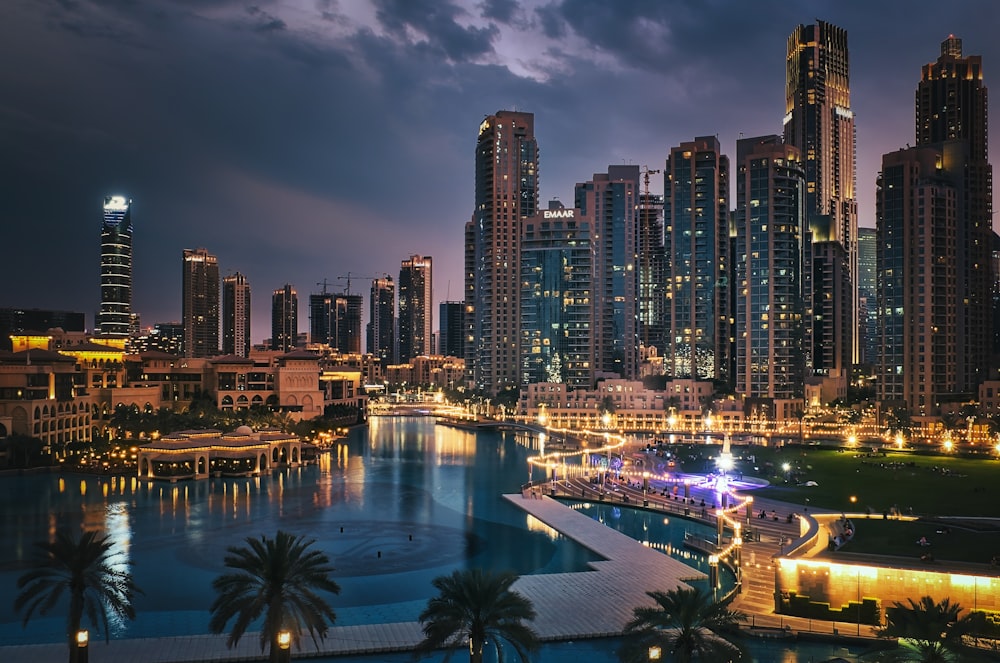 a large body of water with a city in the background