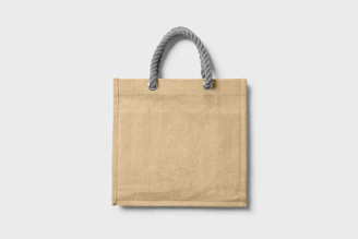 A stylish small tote bag in natural fabric, perfect for daily errands.