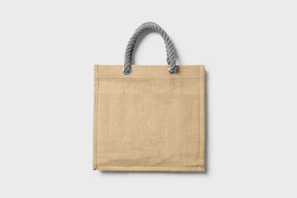 Handcrafted jute bag with natural fibers and reinforced handles.