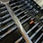 Close-up of locksmith tools arranged neatly on a wooden workbench.