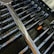 Close-up of locksmith tools arranged neatly on a wooden workbench.