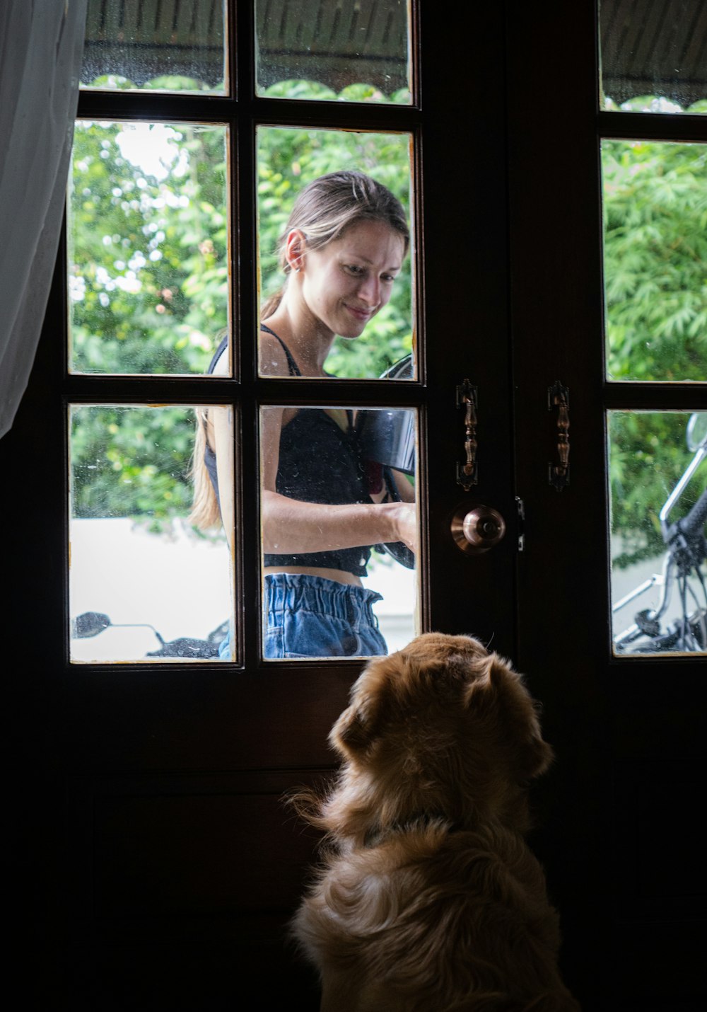 a person looking out a window