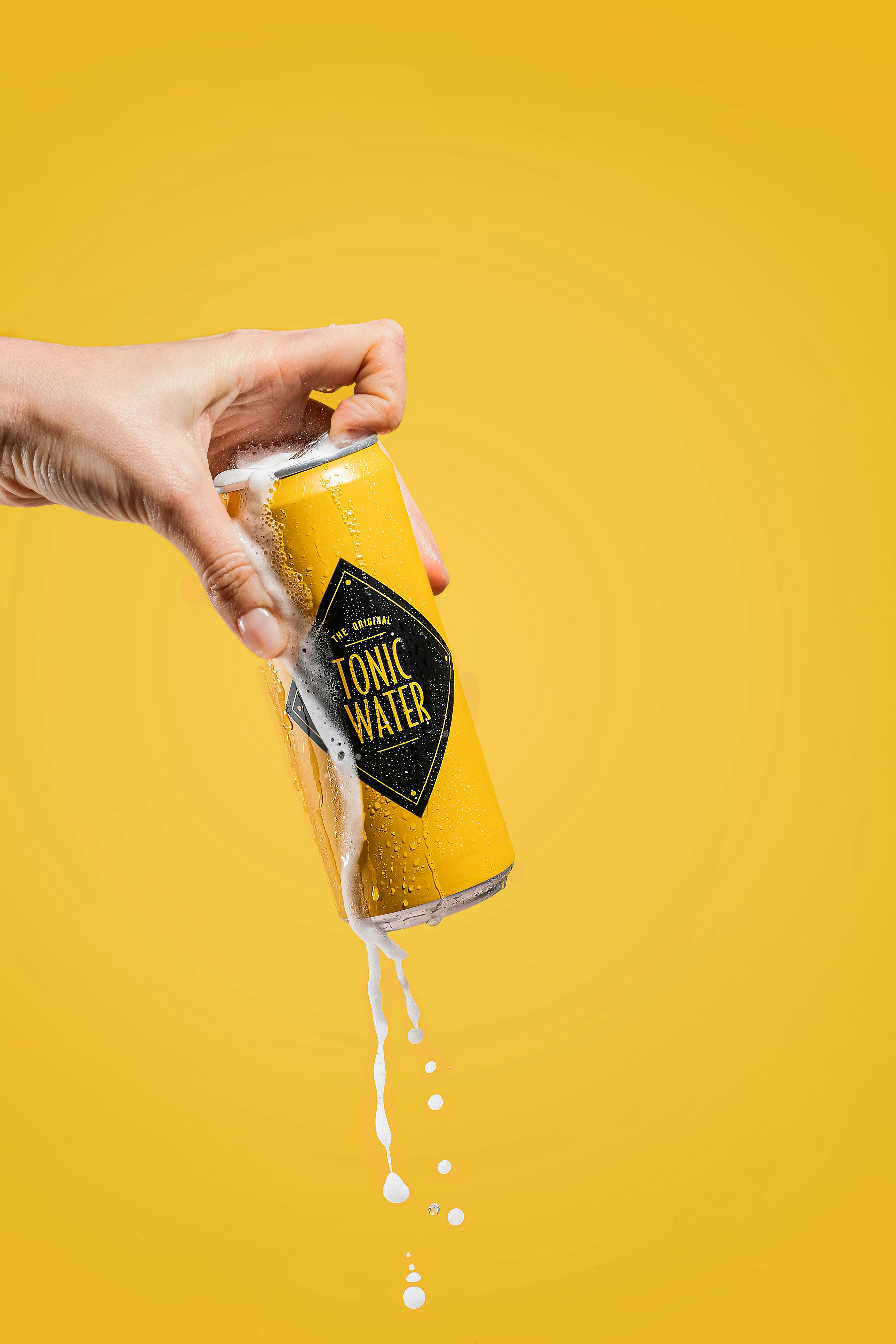 a person holding a bottle