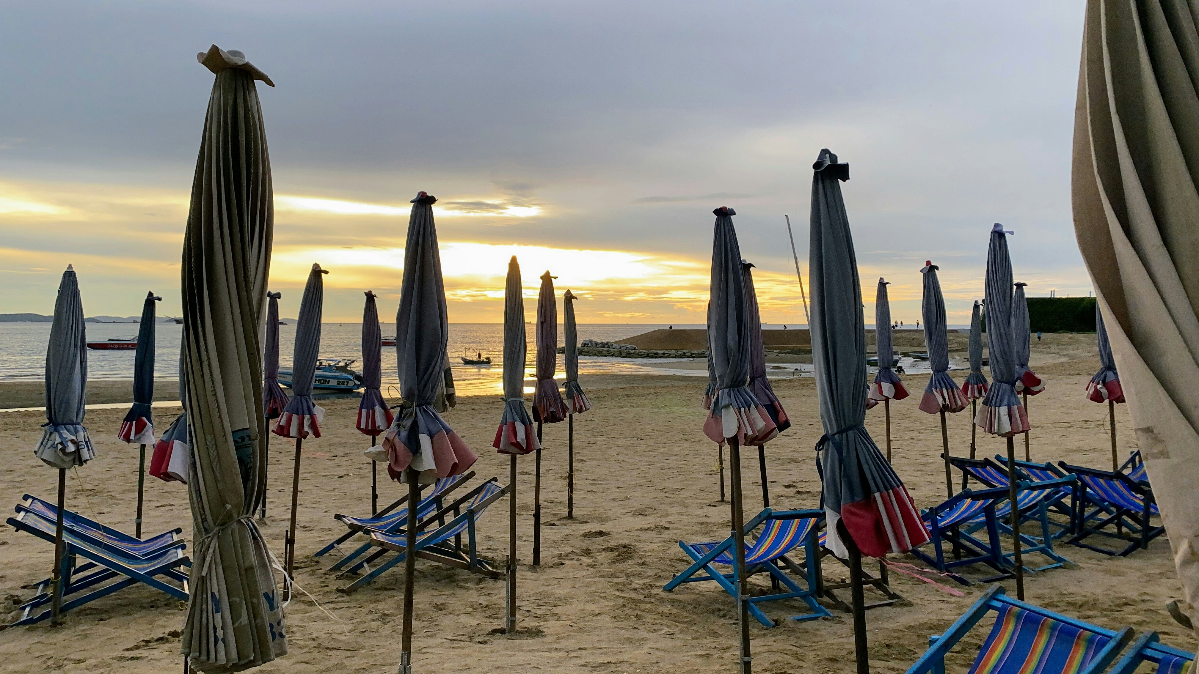 a beach is filled with umbrellas