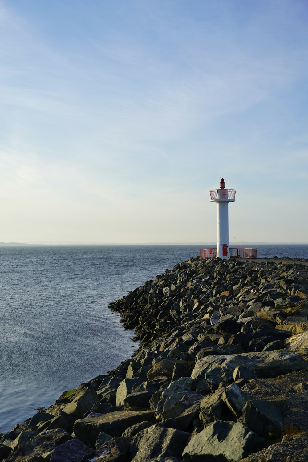 a lighthouse on a rocky shore