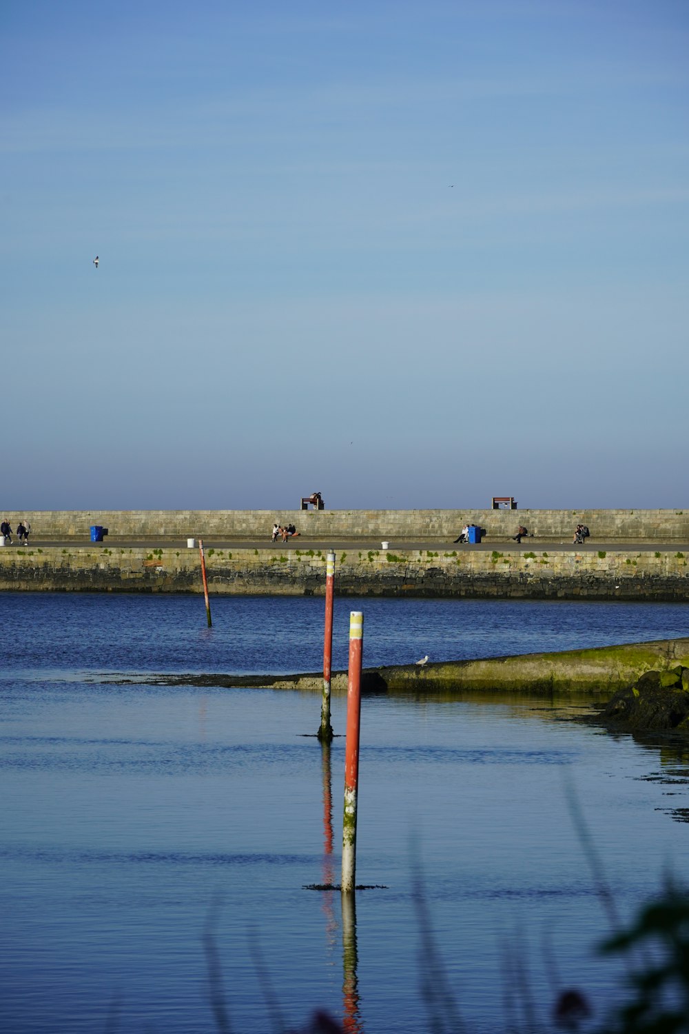 a body of water with a group of people on it