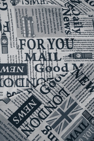 a black and white photo of a newspaper