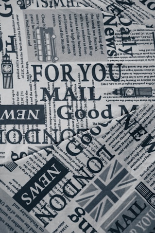 a black and white photo of a newspaper