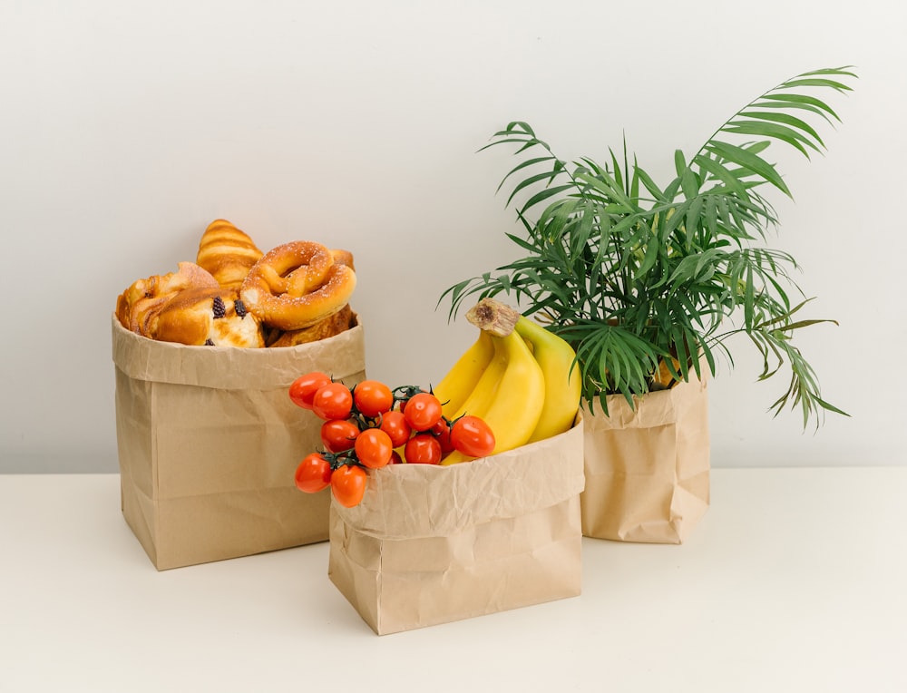 a couple of baskets with fruits in them