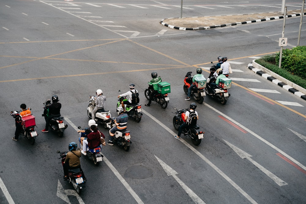 a group of people riding motorcycles