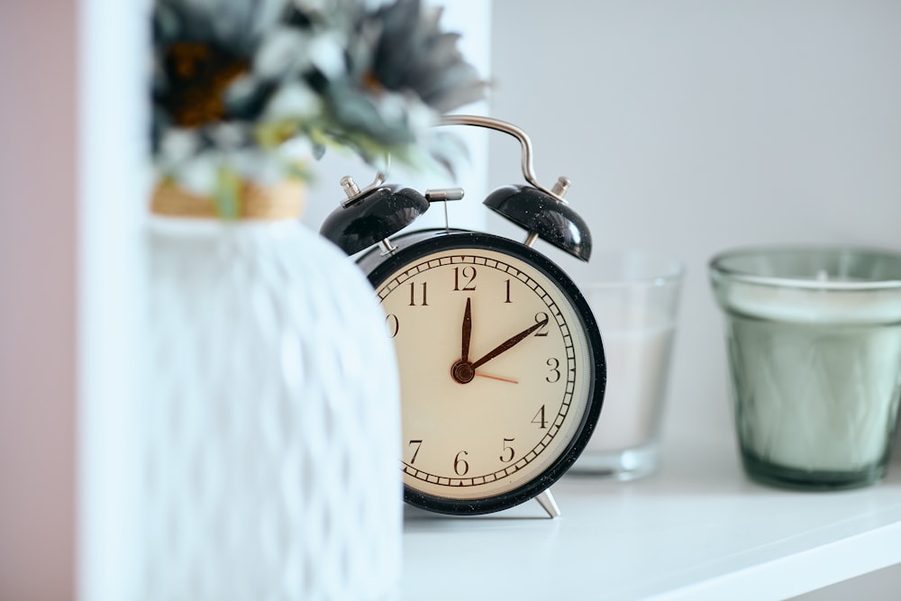 a clock and some glasses