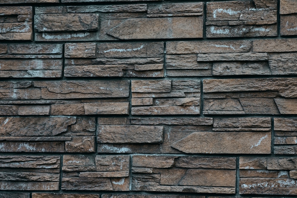 um close up de uma parede de tijolos