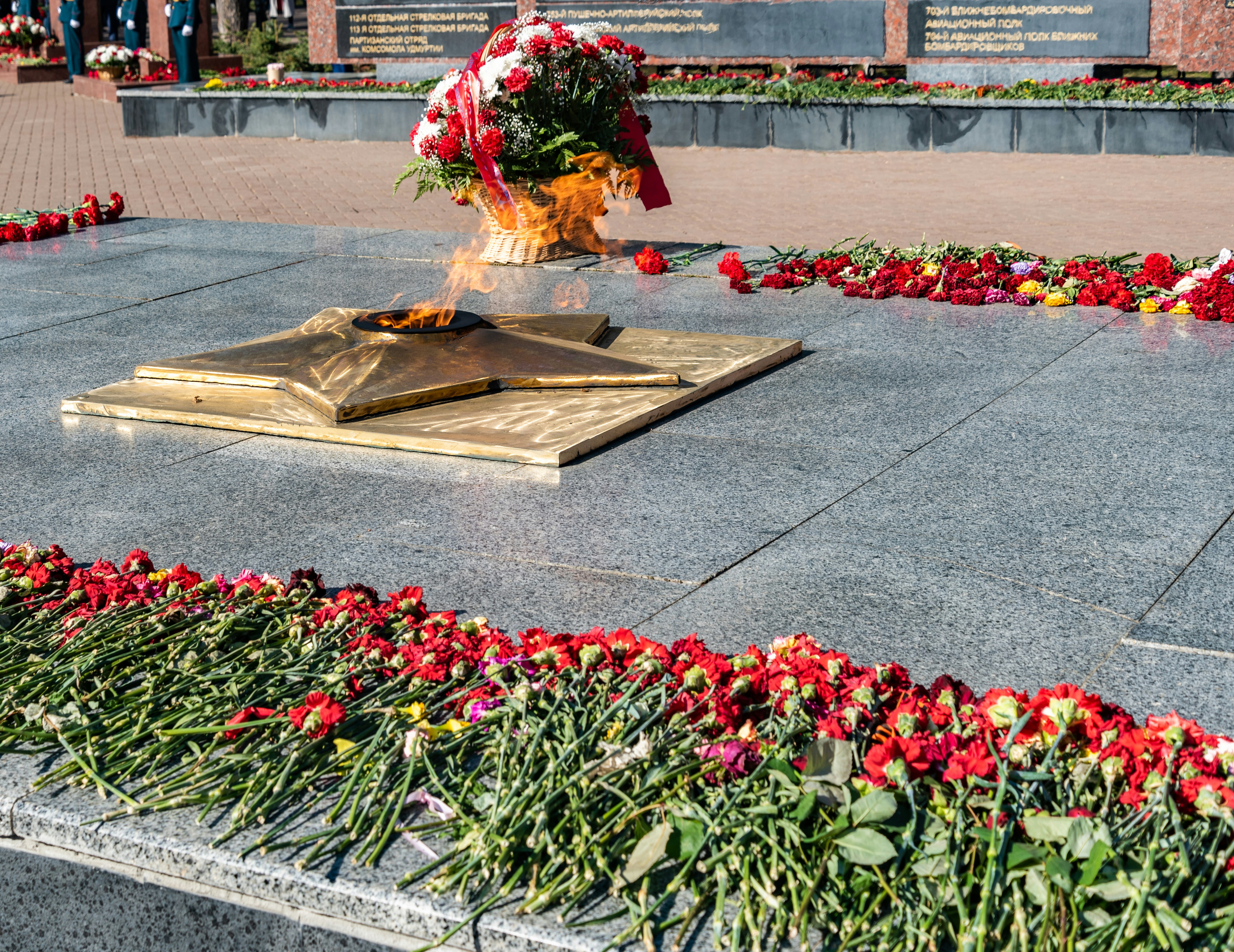a flower arrangement on a grave