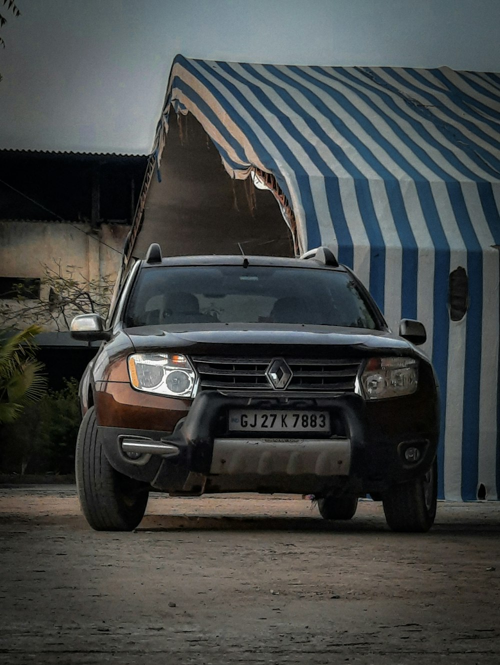 a car parked in front of a building