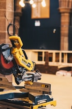 a yellow and black construction vehicle