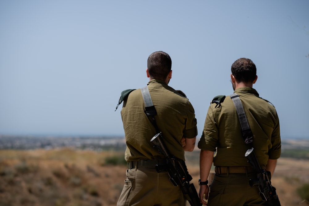 a couple of men in uniform