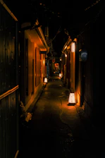 A warmly lit narrow Damascus alley with subtle honey gold and olive green accents reflecting the tour’s vibe.