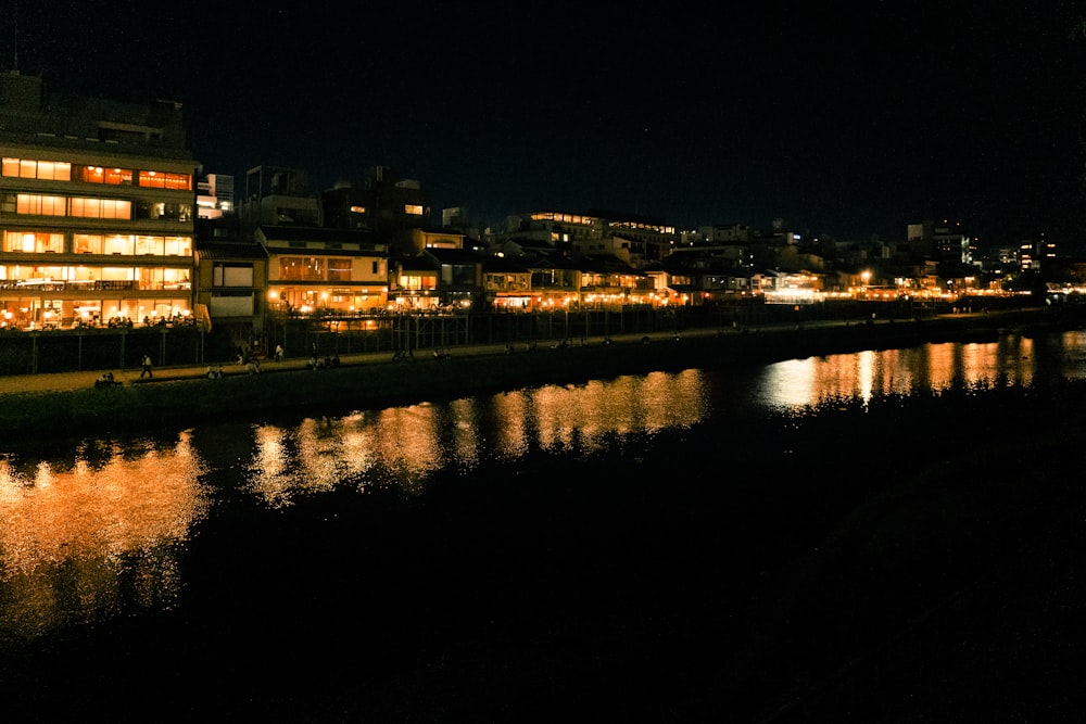 a body of water with buildings along it