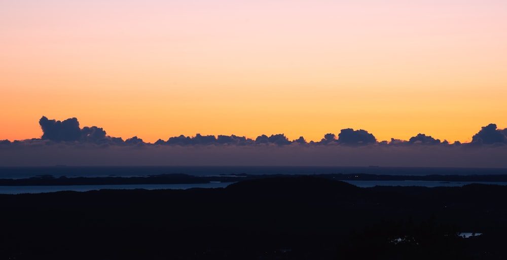 a sunset over a lake